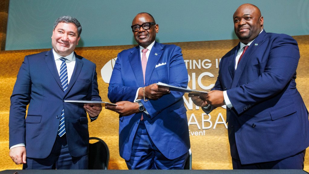 Eurasian Resources Group and DRC’s Entreprise Générale de Cobalt officials exchange MoU documents at Mining Indaba 2026, supporting formalisation of artisanal mining.